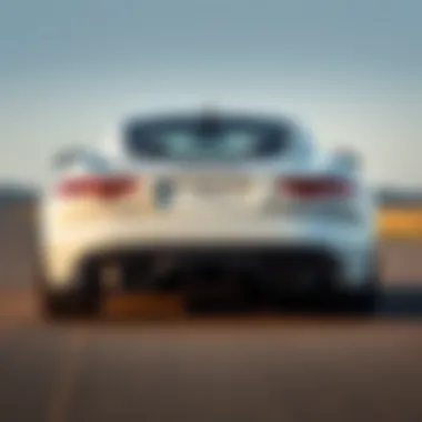 Rear view of the Jaguar F-Type R Coupe emphasizing its powerful stance and exhaust design