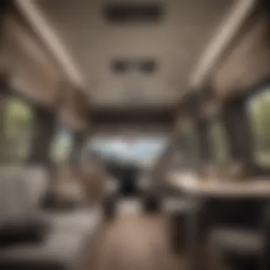 An interior view of a well-designed lightweight camper, highlighting space efficiency and modern amenities.