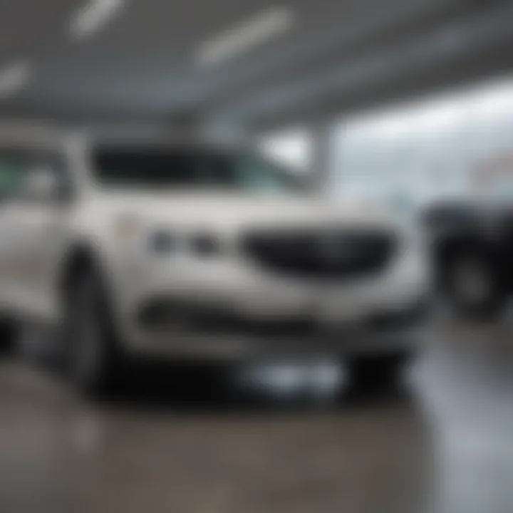 Service area of a Buick dealership with technicians working