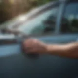 A close-up view of a car window being repaired with precision tools