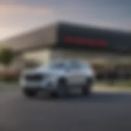 Exterior view of a GMC dealership in Denton, TX showcasing a range of vehicles