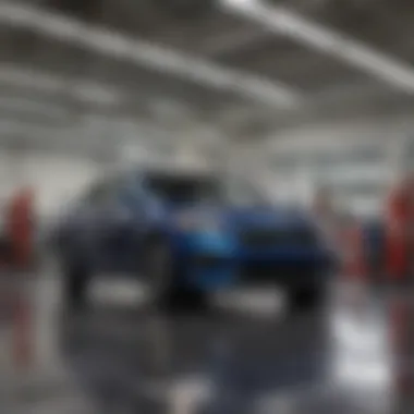 Service Excellence at Hometown Kia Service area with technicians working on vehicles