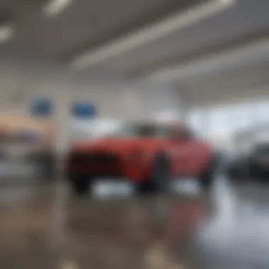 Inside Tremonton Ford dealership featuring vehicle display and customer service area