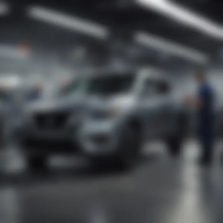 Technicians working on vehicles in the service department