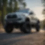 Detailed view of a Tacoma with a lift kit installed showcasing its elevated stance