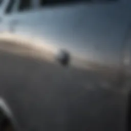 Close-up view of a scratched car door